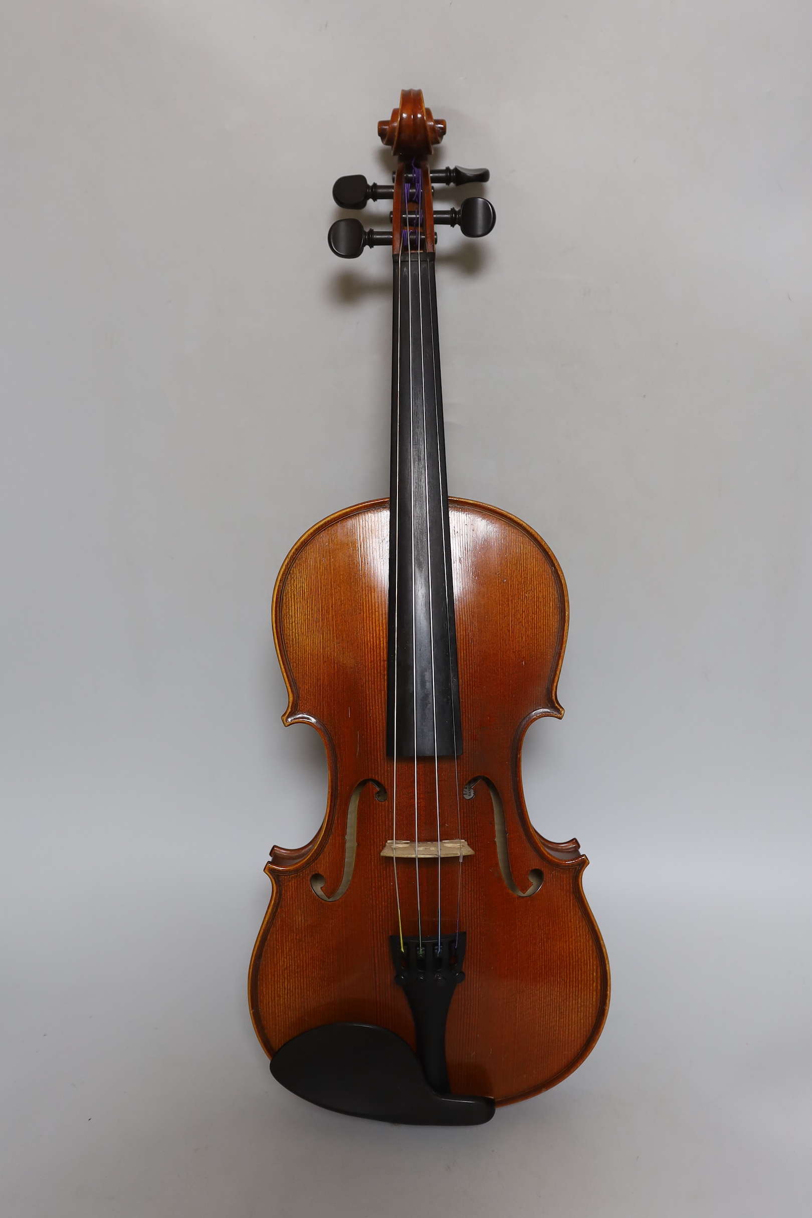 A violin, in fitted case (German)